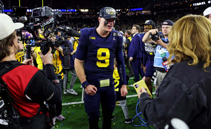 Jan 8, 2024; Houston, TX, USA; Michigan Wolverines quarterback J.J. McCarthy (9) celebrates after beating the Washington Huskies in the 2024 College Football Playoff national championship game at NRG Stadium.